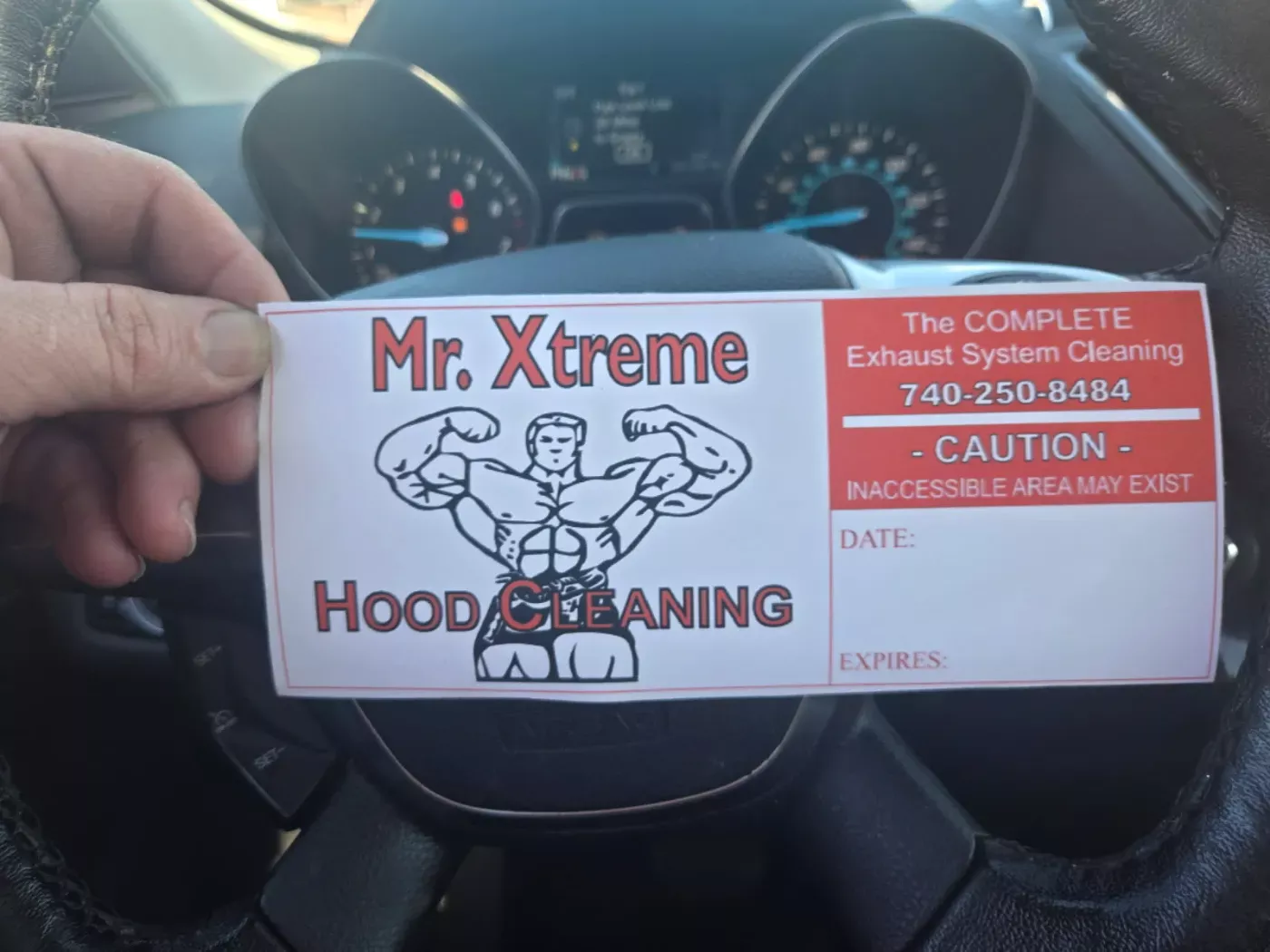 Mr. Xtreme hood cleaning service sticker with date and expiration